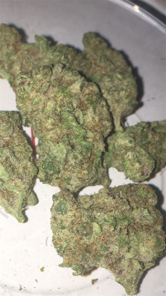 Predator Pink marijuana strain flower with sweet and tropical flavor and relaxed / happy effects - Rare Harvest hybrid