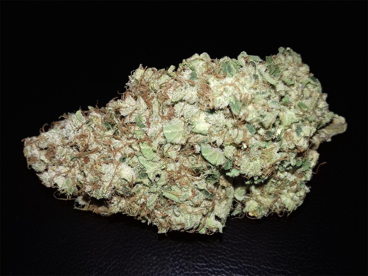 Presidential OG marijuana strain flower with pine and earthy flavor and sleepy / relaxed effects - Rare Harvest indica