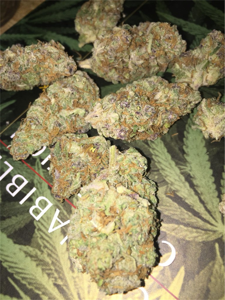 Purple Bush marijuana strain flower with berry and blueberry flavor and creative / relaxed effects - Rare Harvest indica
