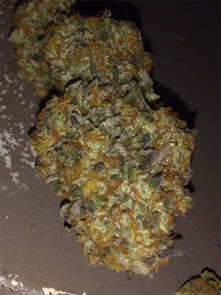 Purple Monkey Balls marijuana strain flower with grape and lavender flavor and relaxed / giggly effects - Rare Harvest indica