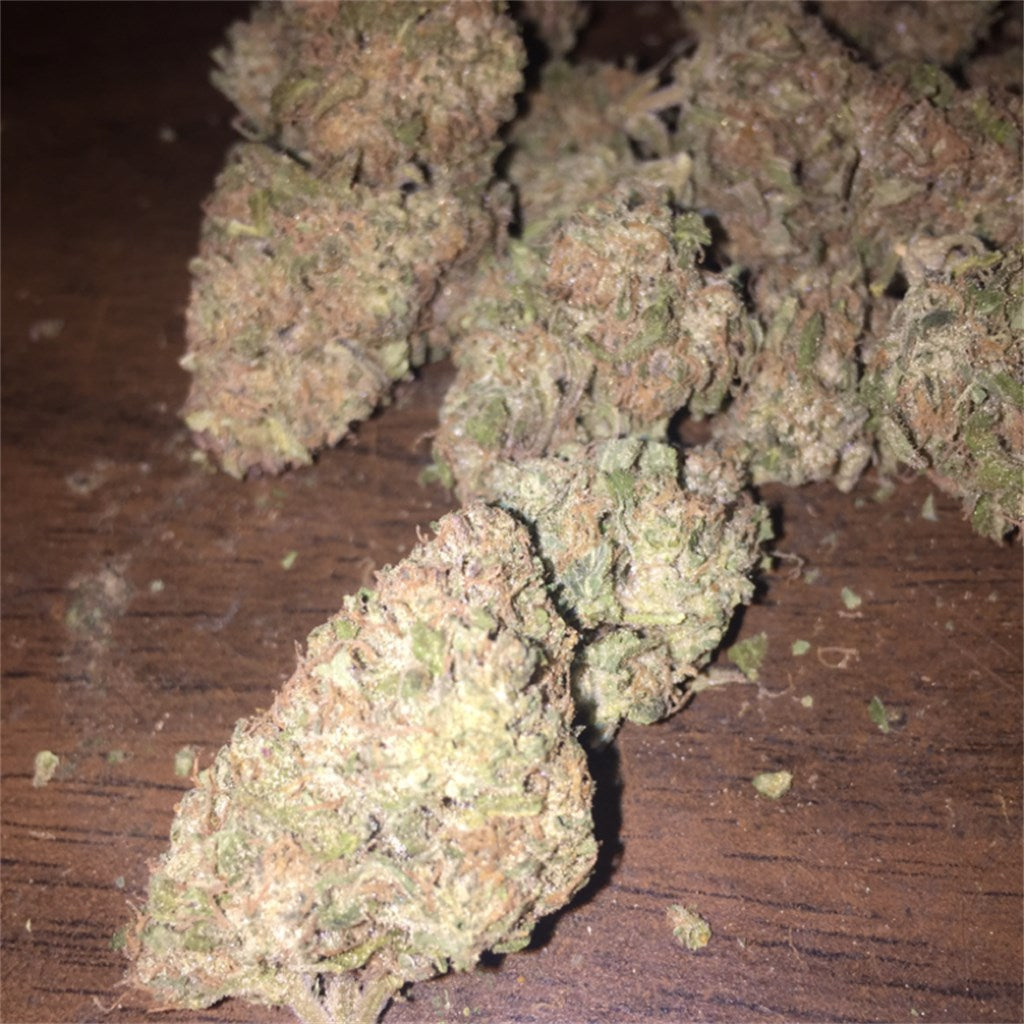 Purple Mr. Nice Guy marijuana strain flower with grape and pungent flavor and sleepy / hungry effects - Rare Harvest indica