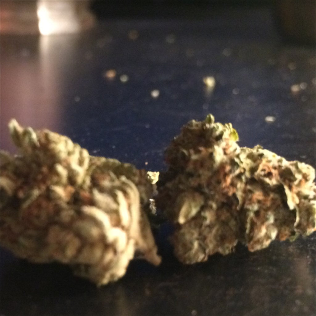 Red Eye OG marijuana strain flower with earthy and pine flavor and sleepy / relaxed effects - Rare Harvest indica