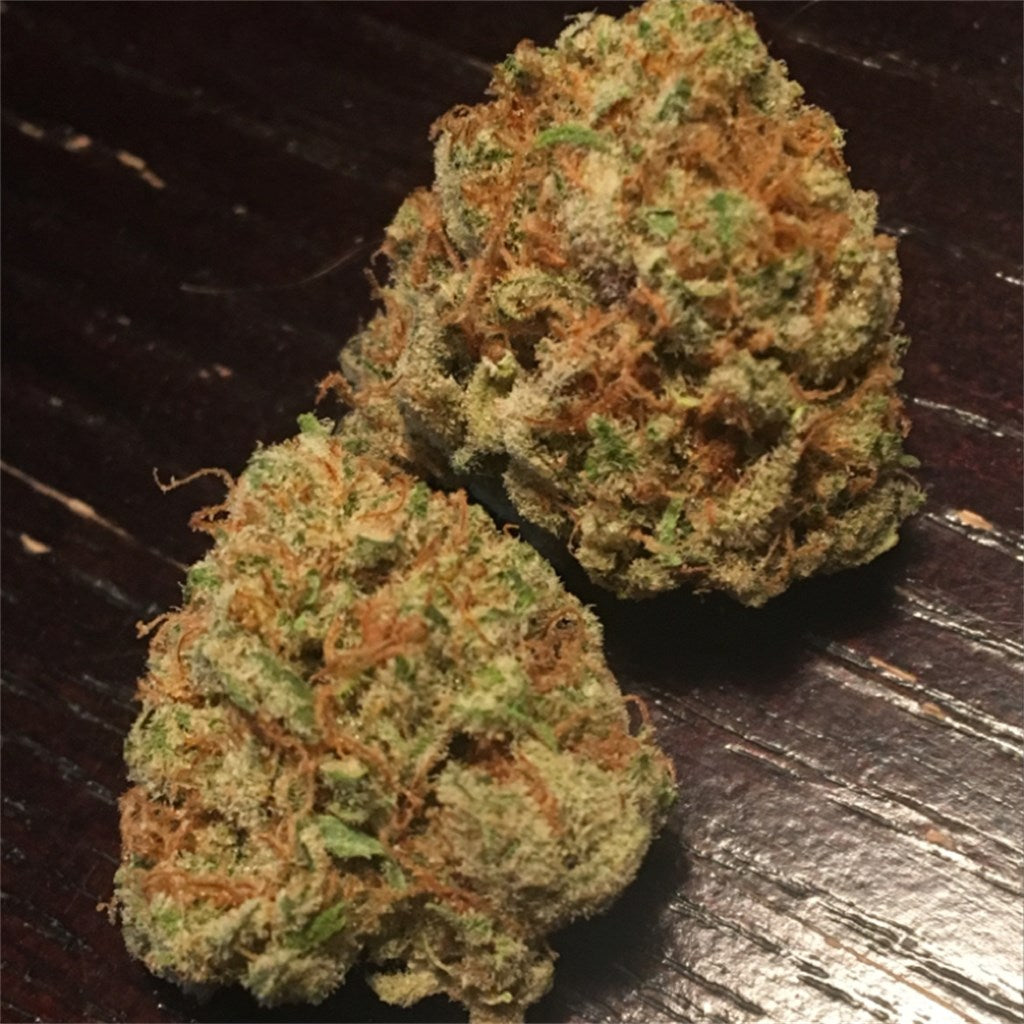 Slimer OG marijuana strain flower with diesel and strawberry flavor and euphoric / creative effects - Rare Harvest hybrid