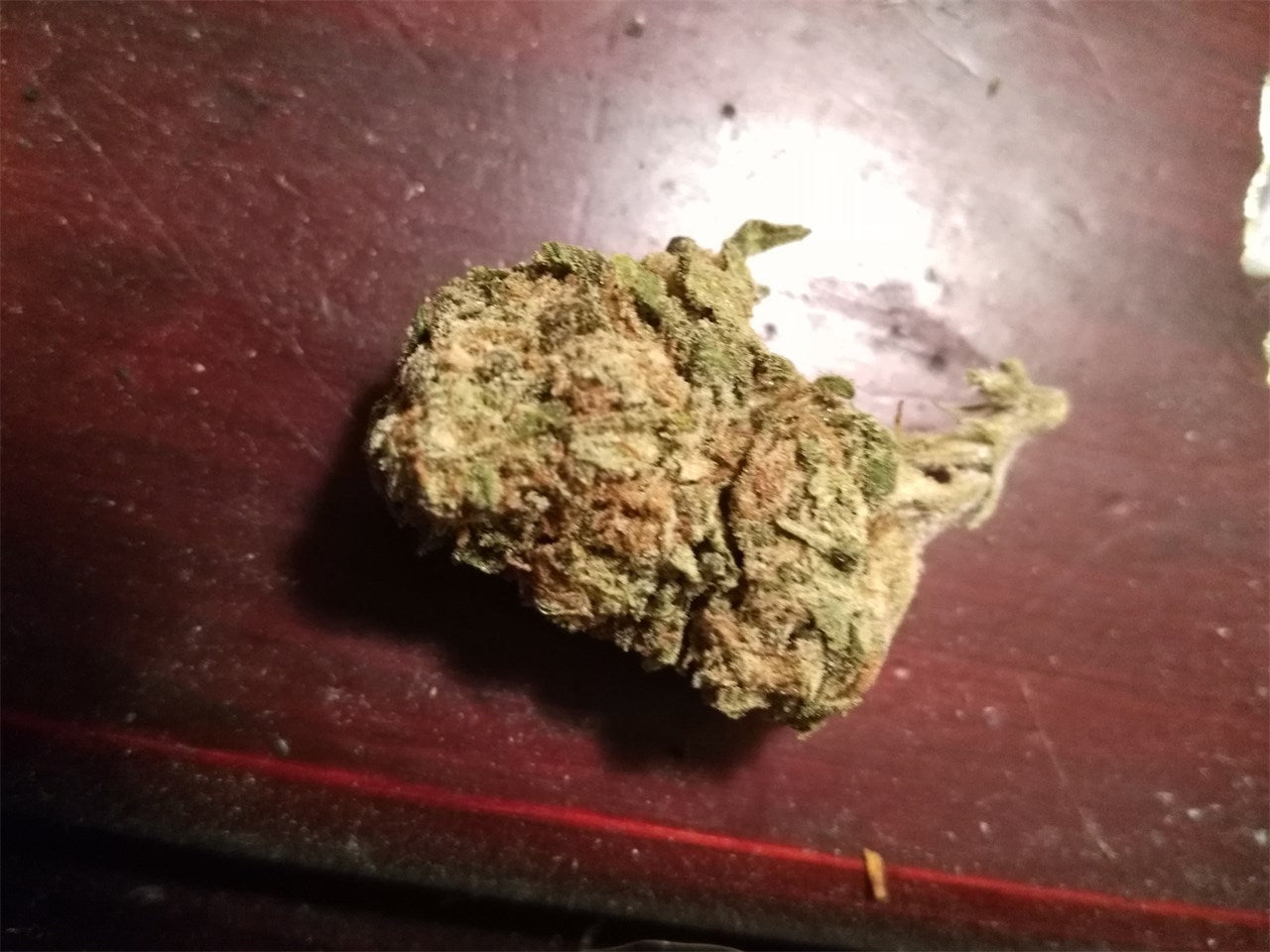 Smooth Operator marijuana strain flower with pungent and earthy flavor and energetic / uplifted effects - Rare Harvest hybrid