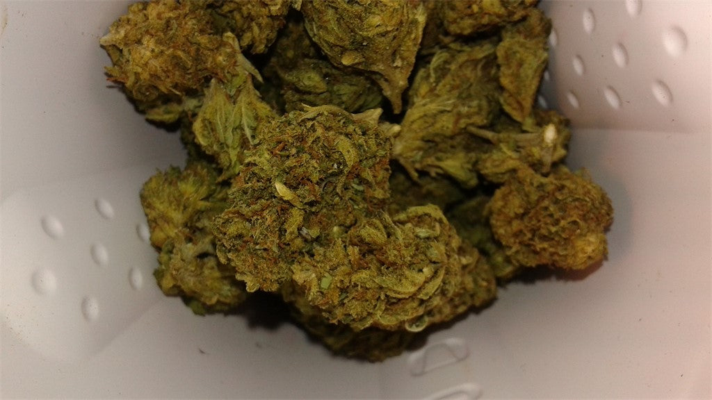 South Central LA marijuana strain flower with blueberry and grape flavor and energetic / uplifted effects - Rare Harvest indica
