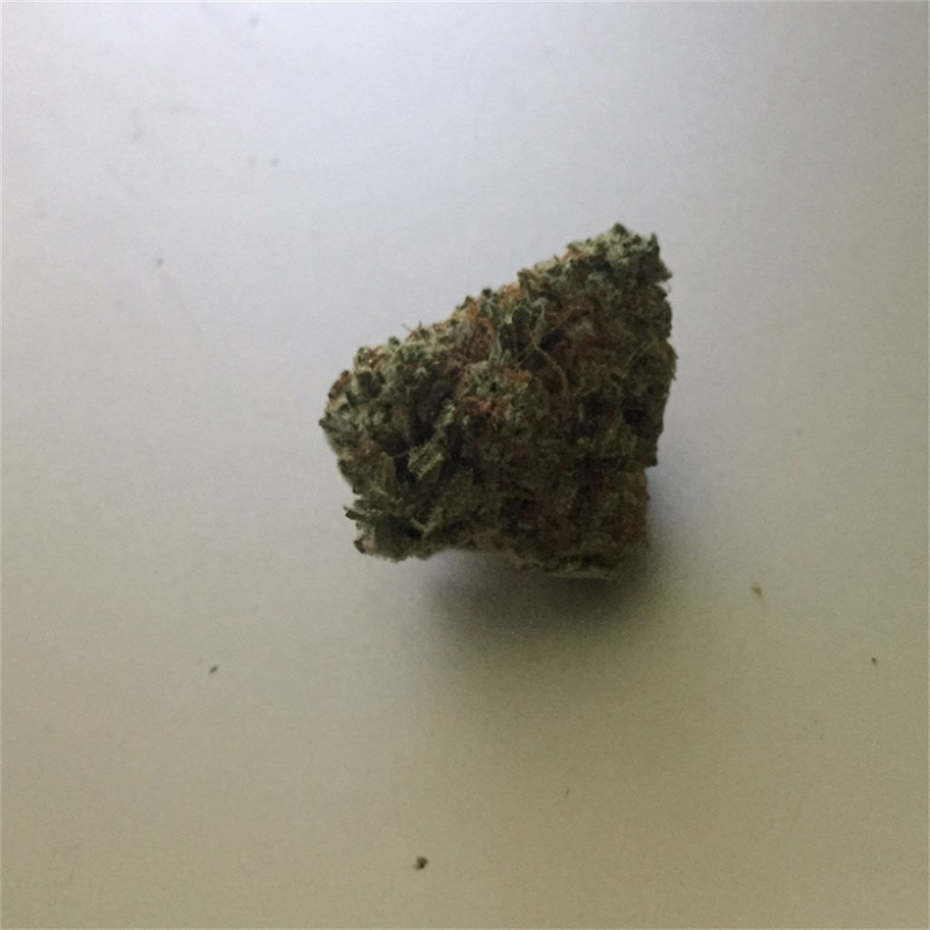 StarBud marijuana strain flower with chemical and earthy flavor and sleepy / relaxed effects - Rare Harvest indica