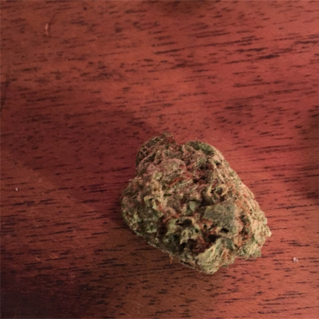 Stevie Wonder marijuana strain flower with orange and blueberry flavor and focused / uplifted effects - Rare Harvest hybrid