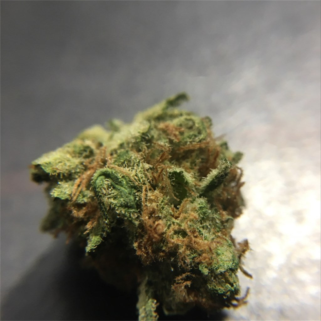 Strawberry Fields marijuana strain flower with strawberry and sweet flavor and relaxed / sleepy effects - Rare Harvest indica