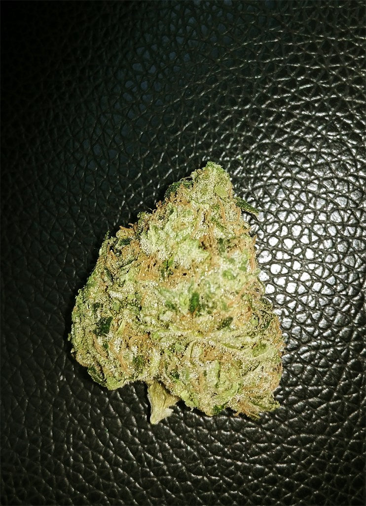 Super Sour OG marijuana strain flower with diesel and citrus flavor and giggly / aroused effects - Rare Harvest hybrid