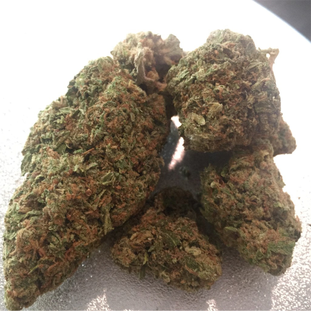 Sweet Diesel marijuana strain flower with diesel and sweet flavor and creative / focused effects - Rare Harvest sativa