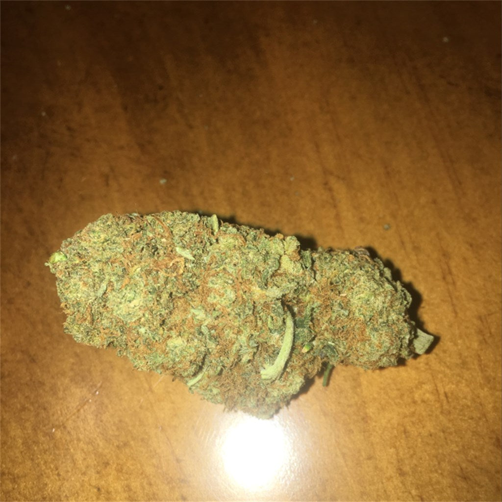 Sweet Skunk marijuana strain flower with citrus and strawberry flavor and energetic / creative effects - Rare Harvest hybrid