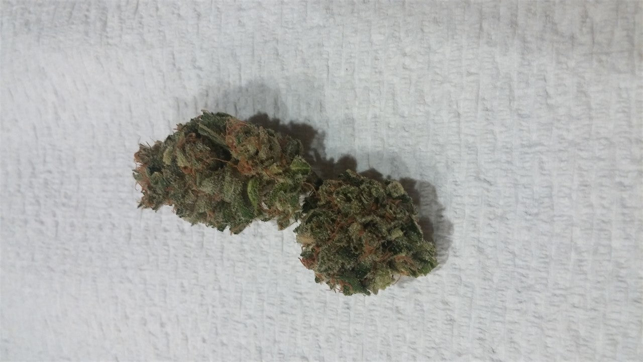 TJ's CBD marijuana strain flower with blueberry and tobacco flavor and focused / happy effects - Rare Harvest hybrid