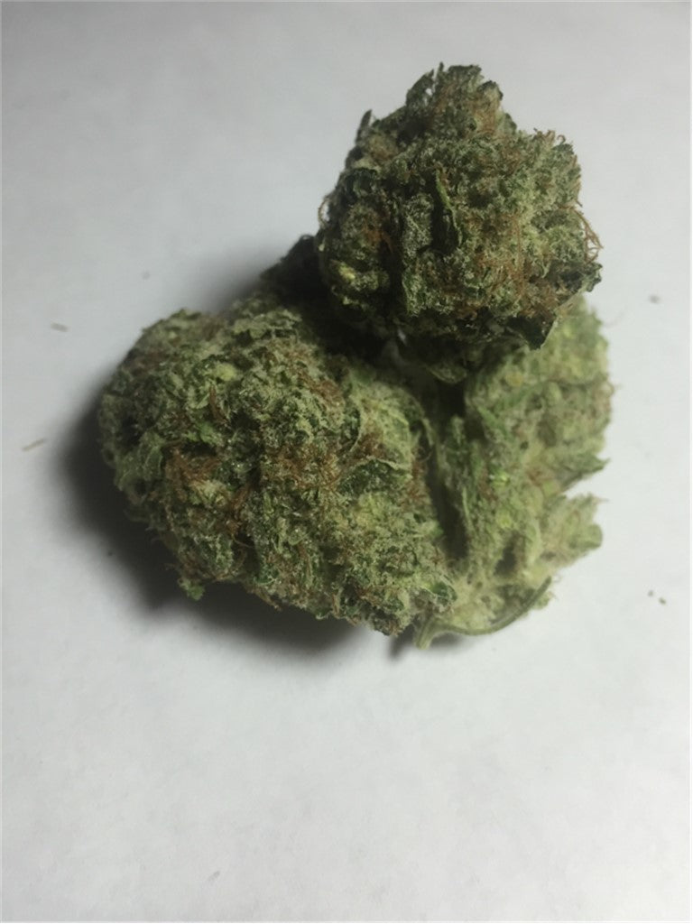 Valley Ghash marijuana strain flower with cheese and tropical flavor and hungry / euphoric effects - Rare Harvest hybrid