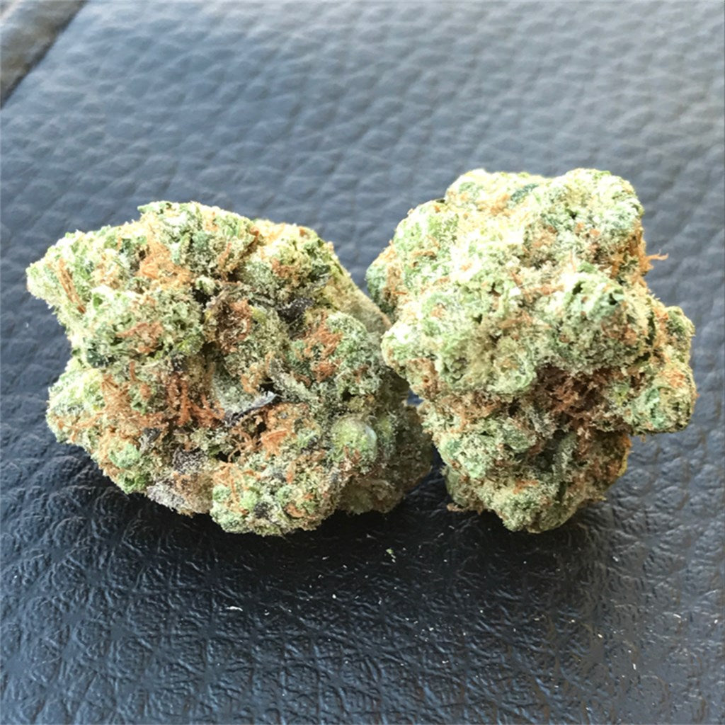 Walter White marijuana strain flower with tobacco and citrus flavor and energetic / happy effects - Rare Harvest hybrid