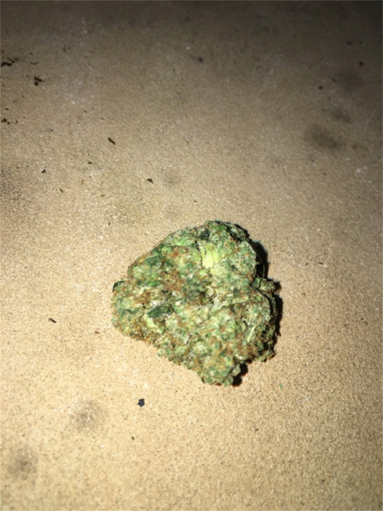 Wellness OG marijuana strain flower with lime and diesel flavor and energetic / creative effects - Rare Harvest hybrid
