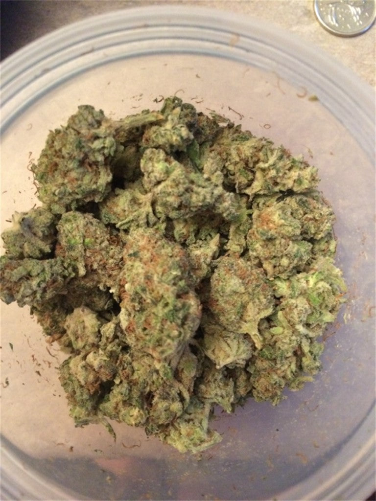 White Fire Alien OG marijuana strain flower with lemon and citrus flavor and relaxed / tingly effects - Rare Harvest hybrid