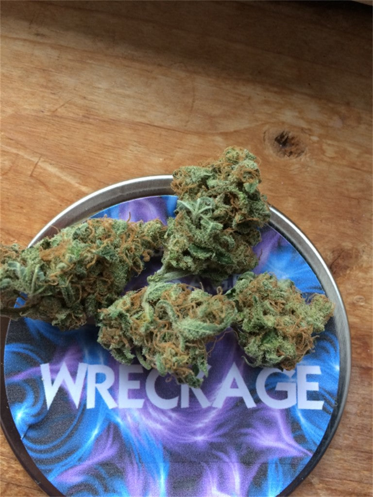 Wreckage marijuana strain flower with sage and nutty flavor and energetic / creative effects - Rare Harvest hybrid
